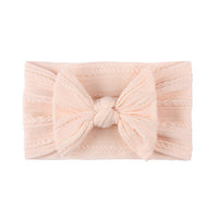 Bandeau pour bébé nœud papillon blanc
